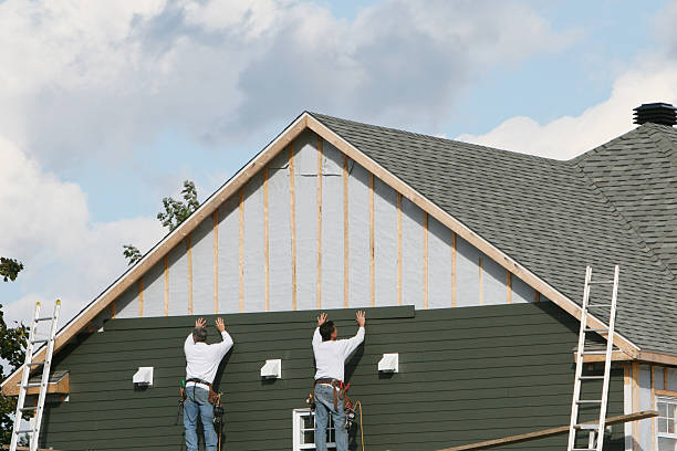 Professional Emergency Siding Repair technician working in The Plains, OH